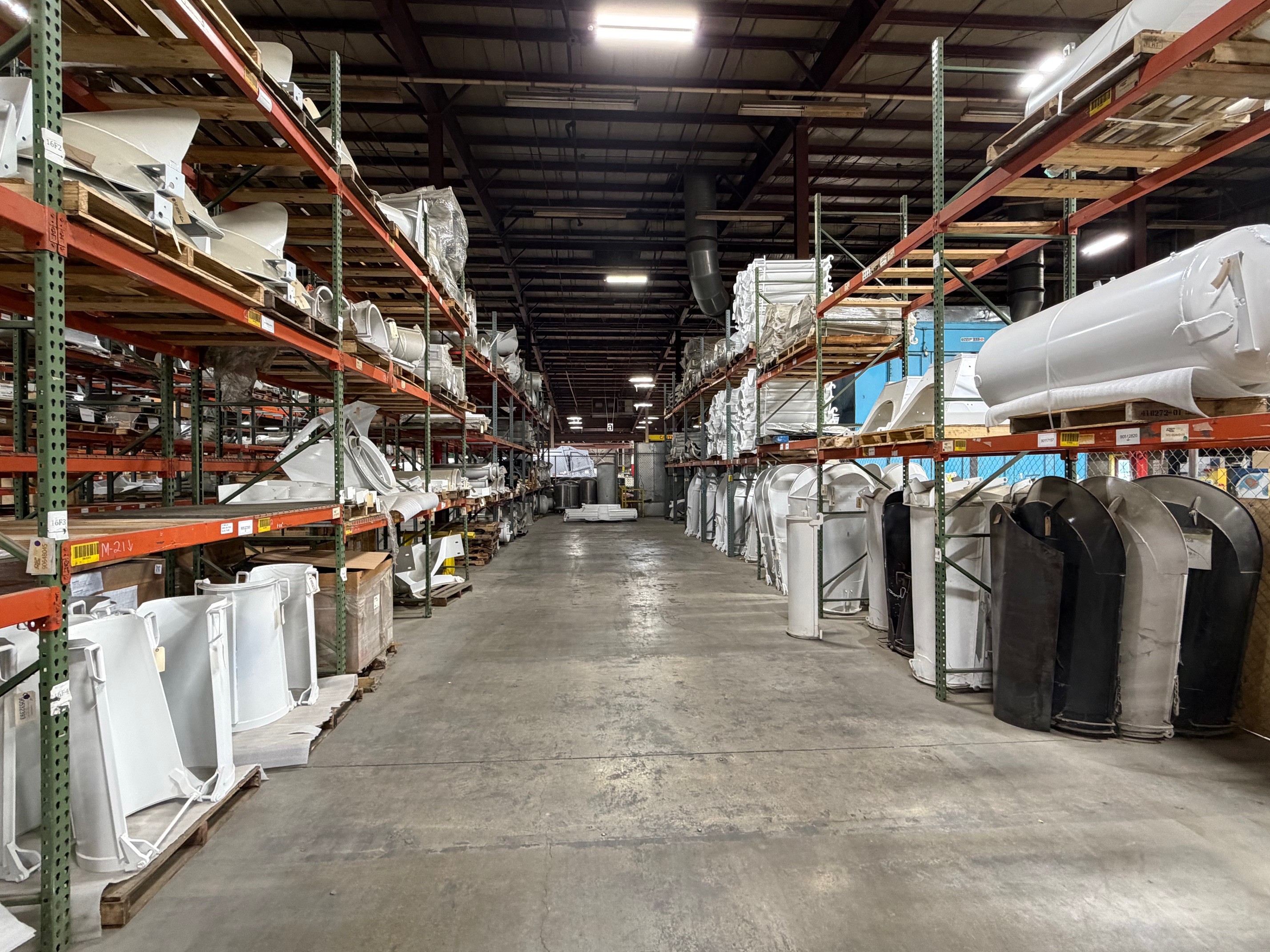 One Source Parts distribution and warehousing supporting OEM and aftermarket parts for mixers, towing, and refuse fleets